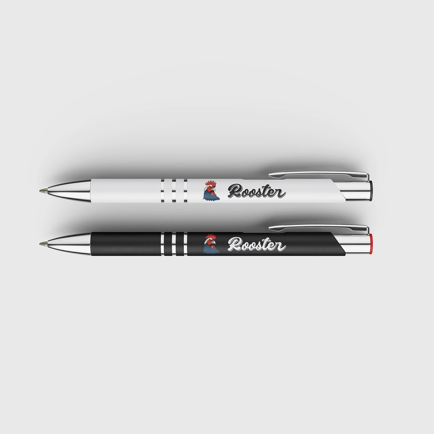 stylos blanc et stylo noir marqués du logo Rooster